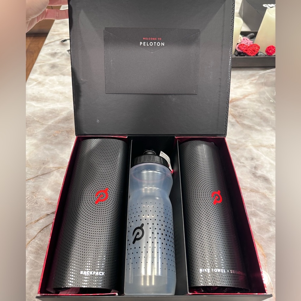 PELETON Gift Box Set; PELETON Water Bottle, Bike Towel + Sweatbands and Backpack